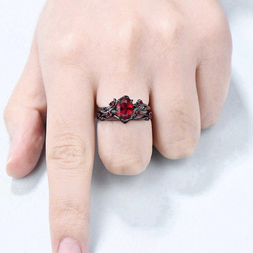 Blood Vine Ring worn on a hand, showing the ring set on the finger